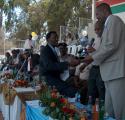 Edward Kairu recieving an award on behalf of the organisation